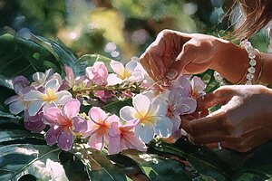Hands that tie flowers and memories of art